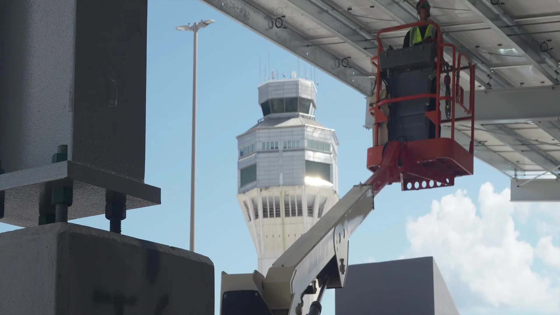 AEC crews installing the solar carport at Luis Muñoz Marín International Airport